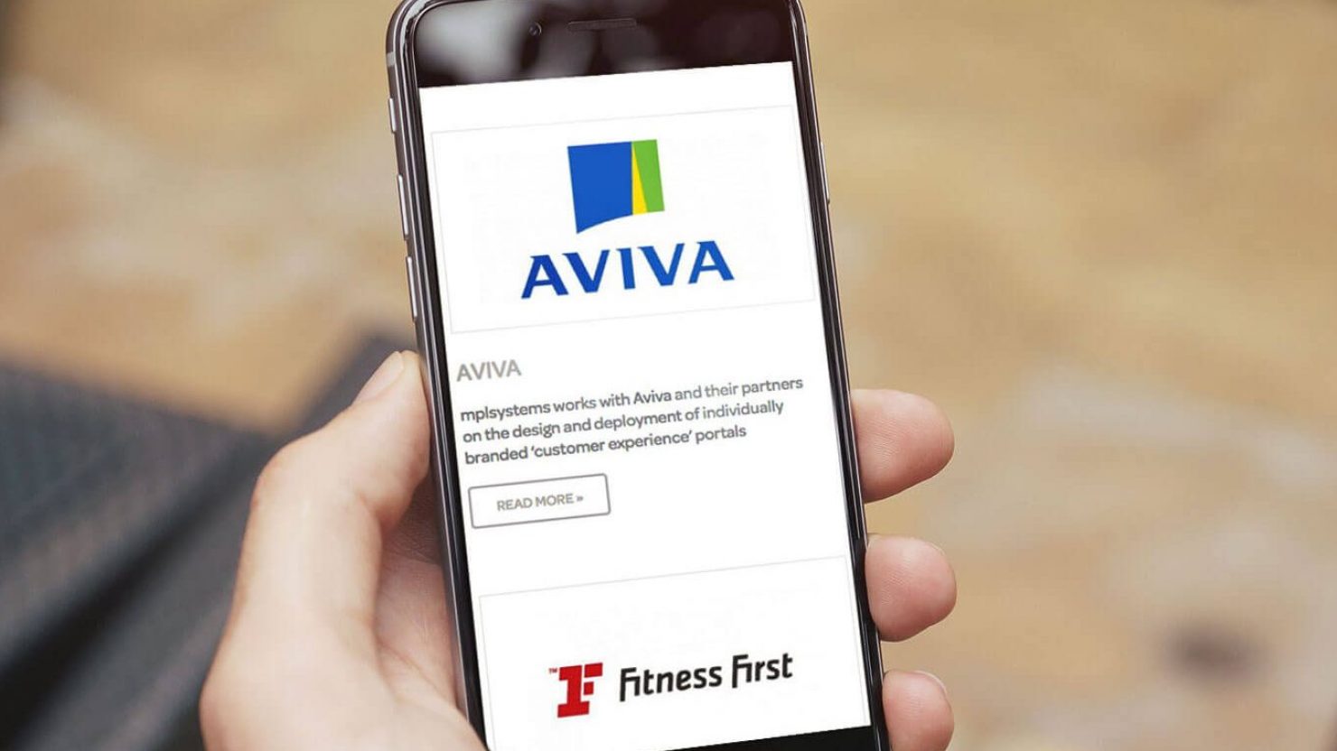 iPhone showing website design and branding for MPL Systems with Aviva and Fitness First logos
